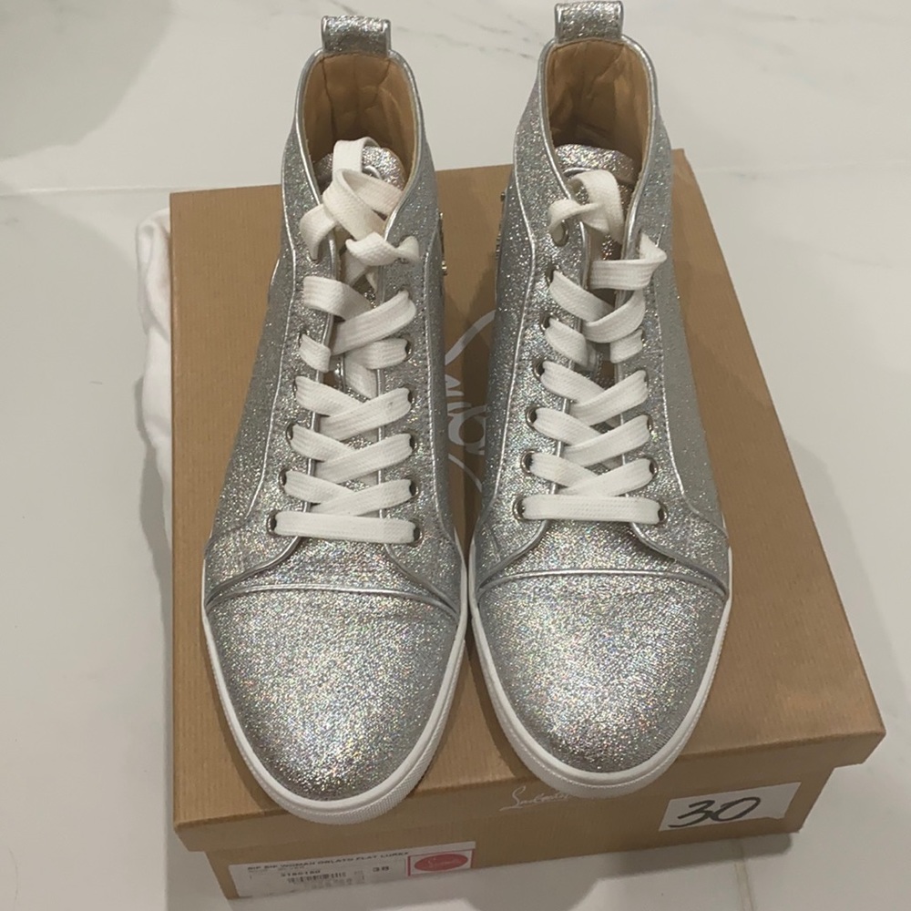 Louboutin sneakers gently worn